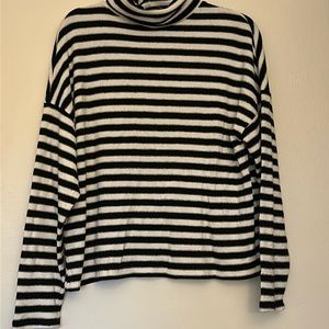 Black and white striped turtleneck sweater